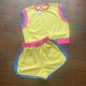 Vibrant Yellow Sleeveless Set with Pink and Blue Accents